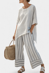Elegant Asymmetrical Blouse and Striped Pants