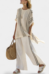 Elegant Ivory Linen Blouse and Black Striped Pants